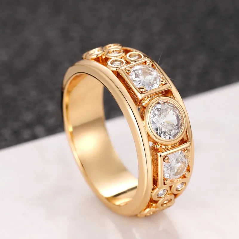 Gold-tone geometric CZ ring with oval center and round clear stones