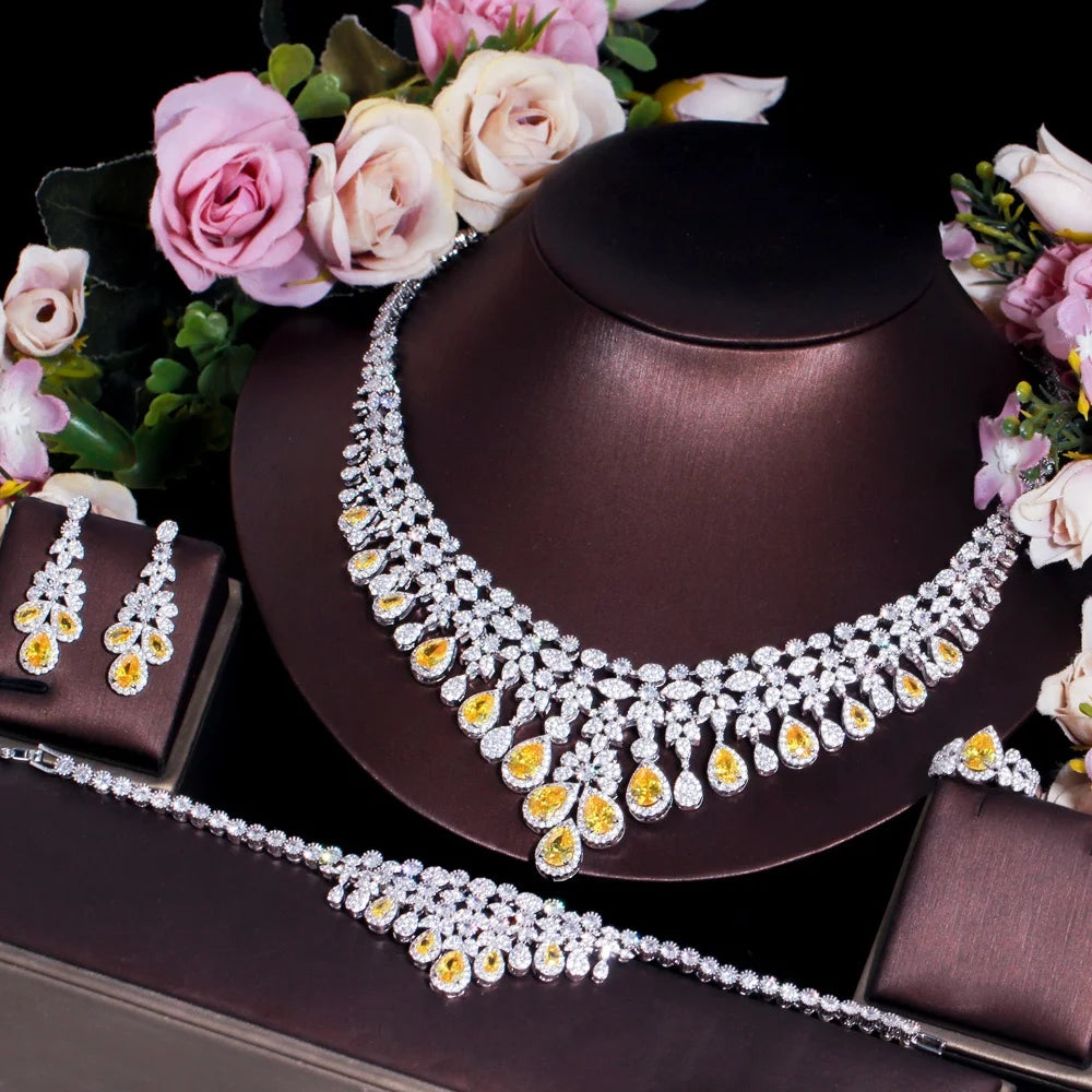 Full bridal jewelry set: crystal necklace, bracelet, and earrings with yellow drop accents
