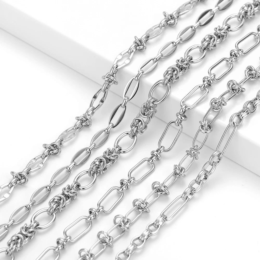 Shiny stainless steel chain links with ring and curb shapes on a length