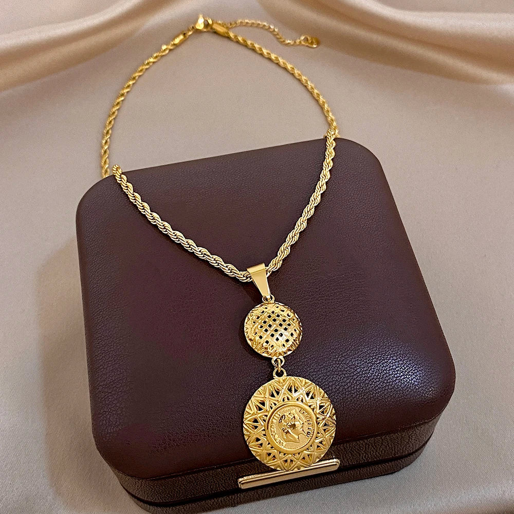 Gold-plated stainless steel necklace with round medallion charm and coin center