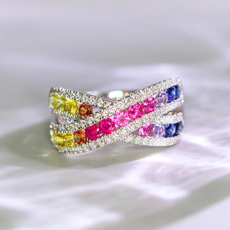 Rainbow CZ cross ring with multicolor stones and pavé band