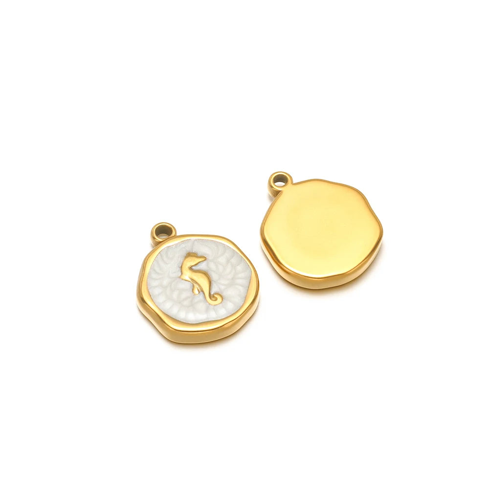 Gold-tone enamel charm pendants: white seahorse motif and plain yellow charm