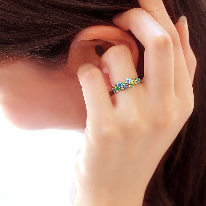Gold-tone multicolor cubic zirconia ring with blue, green and clear stones
