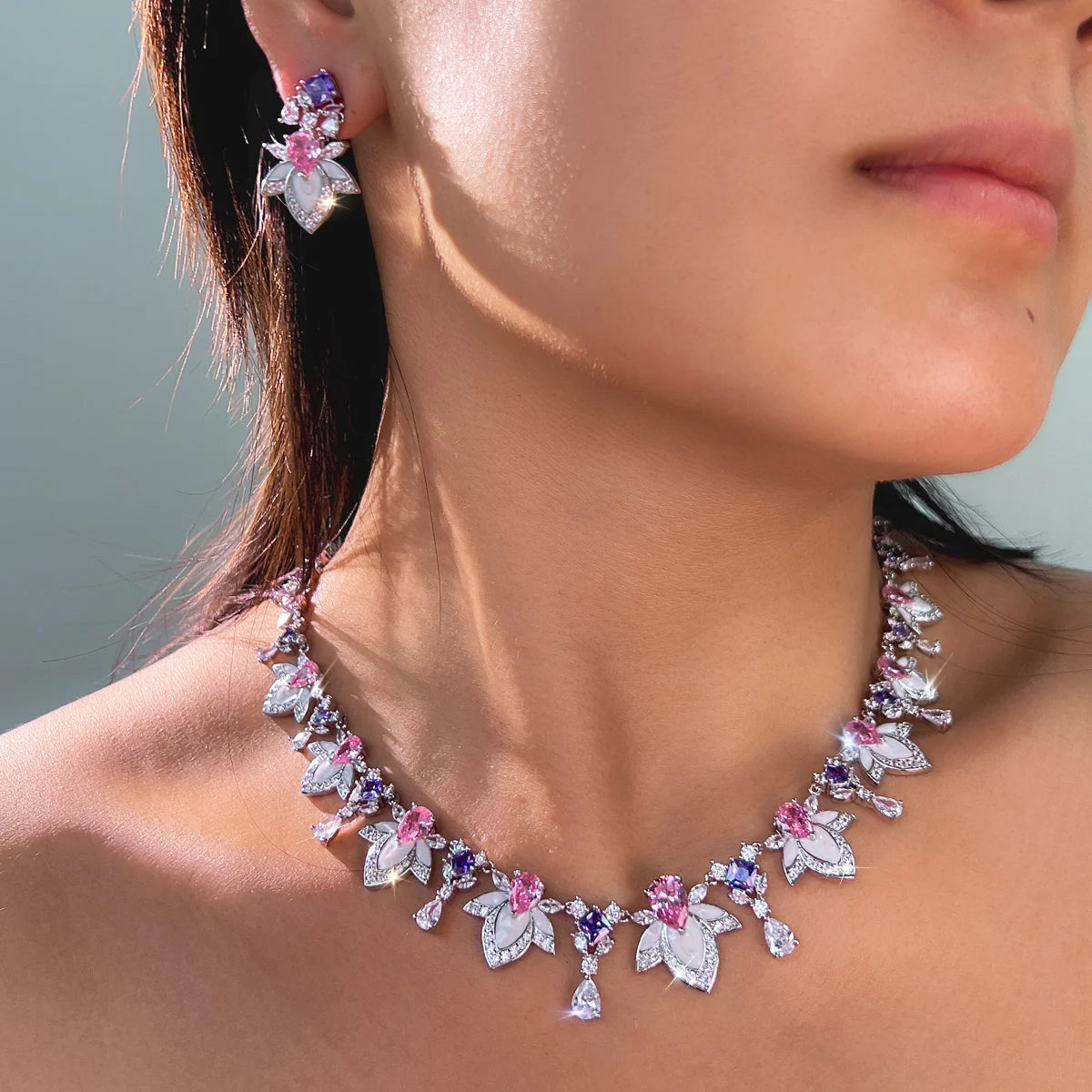 Multicolor cubic zirconia necklace and drop earring set, leaf and bow motif