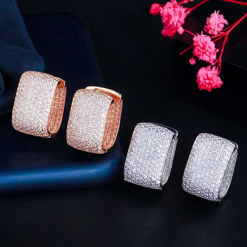 Square cubic zirconia hoop earrings, one rose-gold tone and one silver tone pair