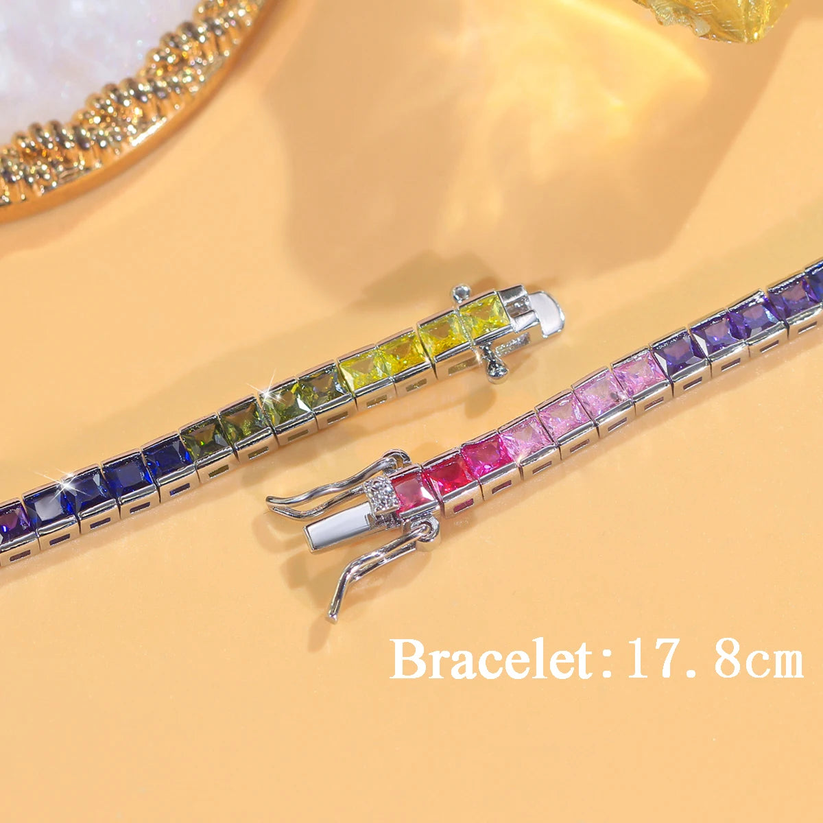 Rainbow zirconia bracelet with silver-tone clasp and square-cut stones
