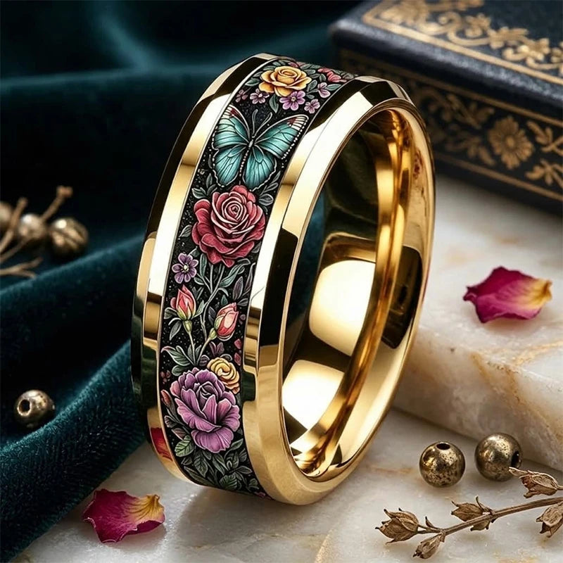 Floral butterfly stainless steel ring with black band and gold-tone inner edge
