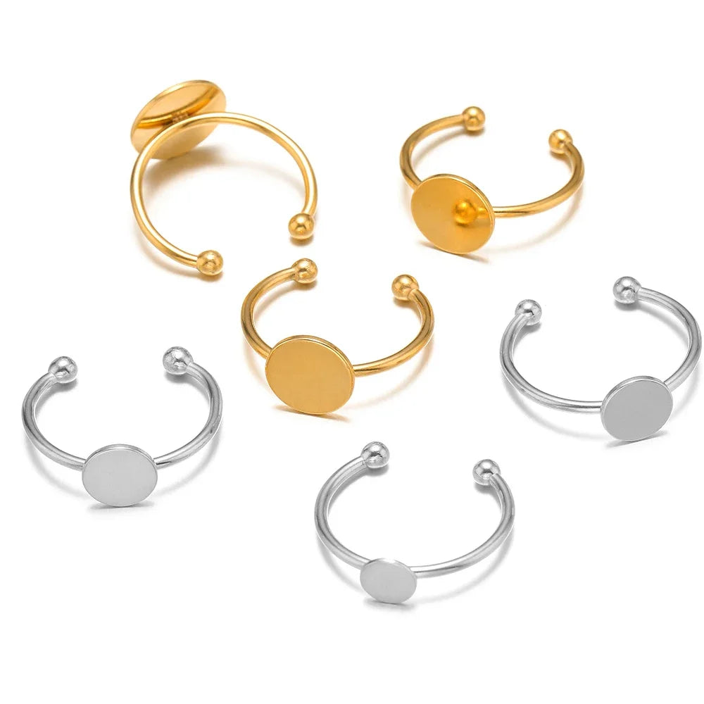 Gold and silver ring blanks with round cabochon bezel discs and ball posts