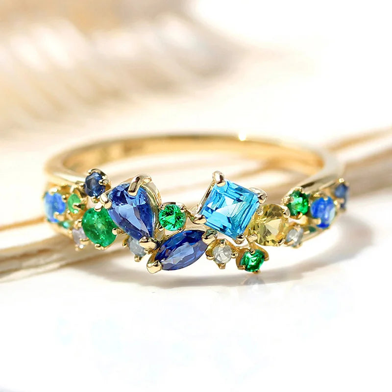 Gold-tone multicolor cubic zirconia ring with blue, green and yellow stones