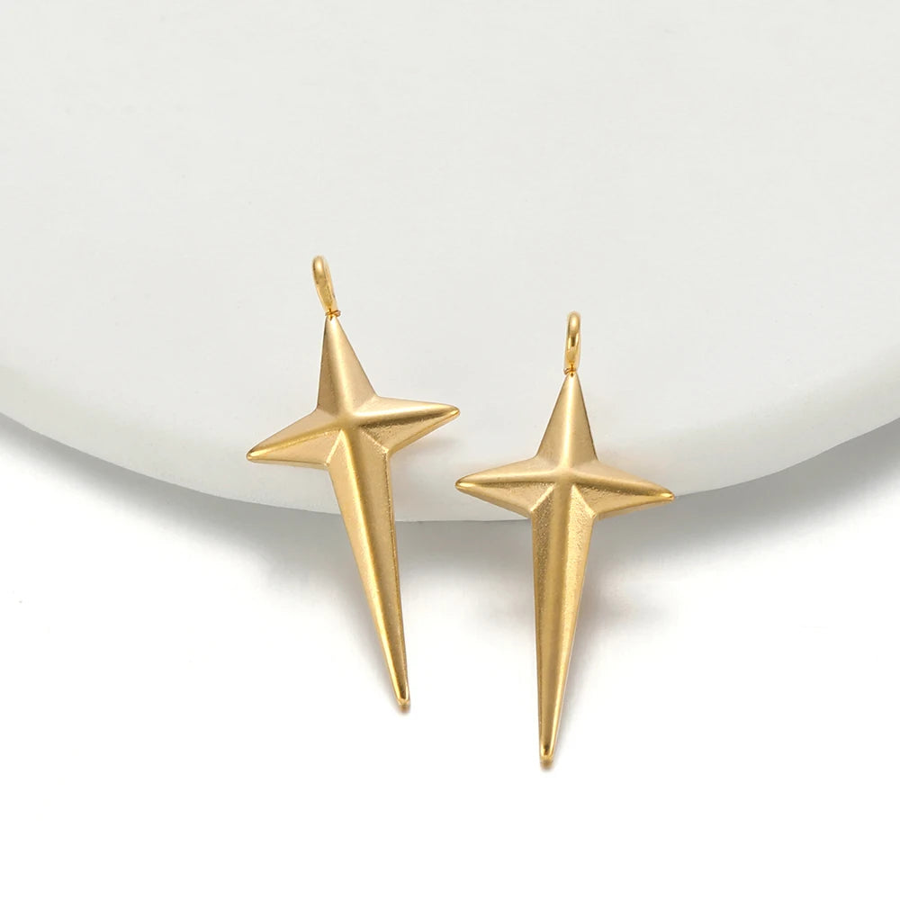 Gold-tone star cross charm pair with hanging loops, stainless steel