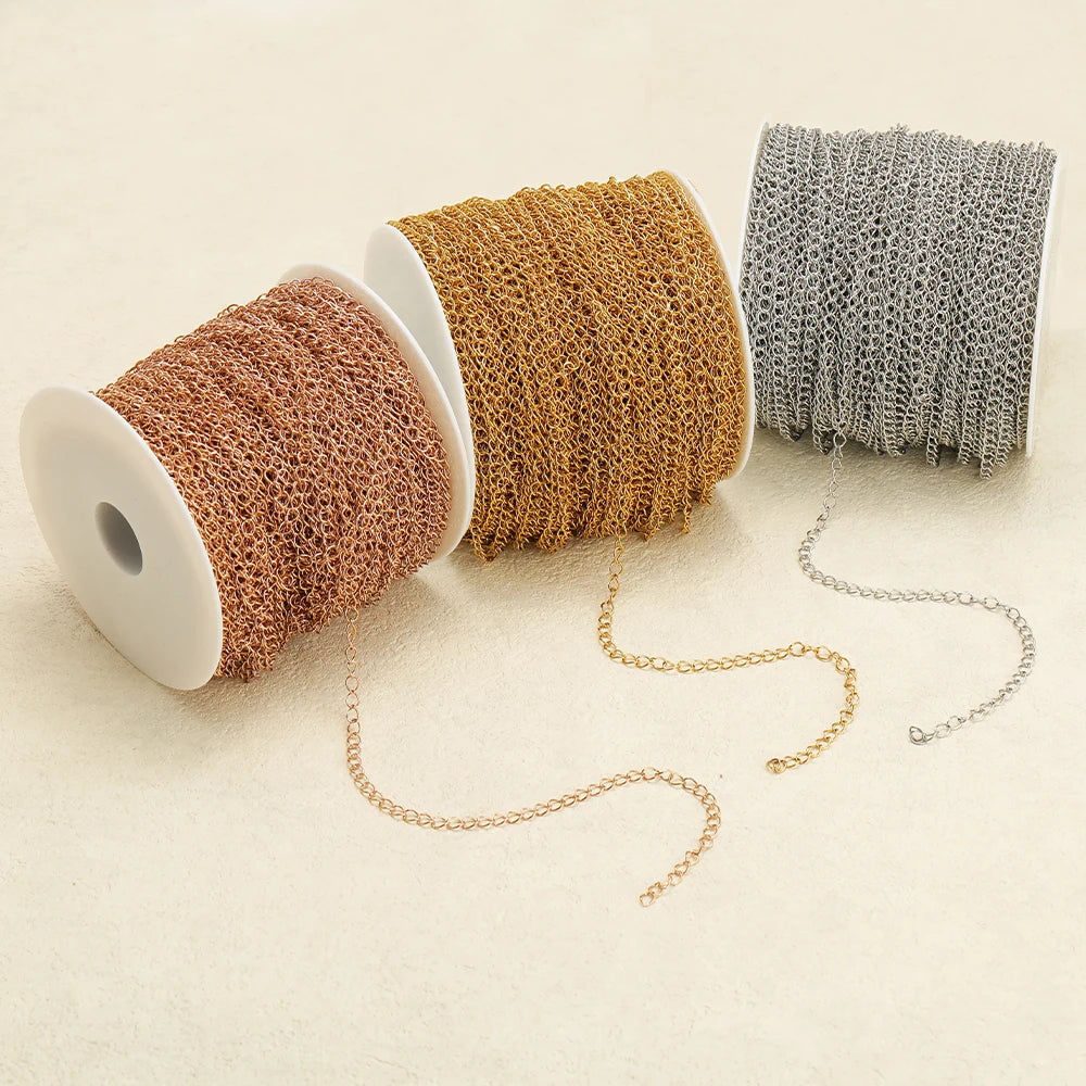 Extension tail chain rolls with linked loops in copper, gold, and silver-gray tones
