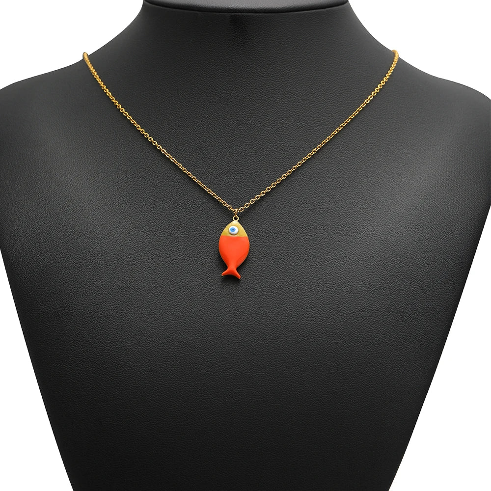 Orange enamel fish pendant on gold-tone chain necklace
