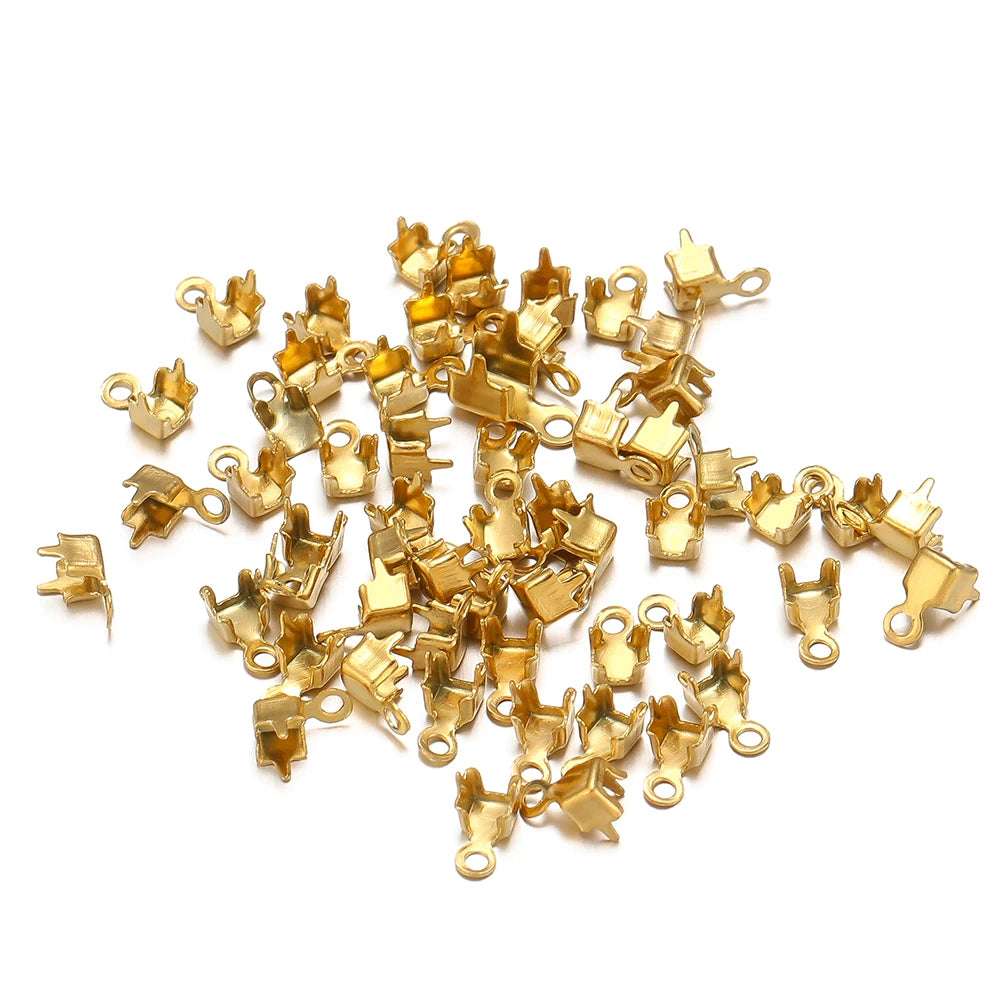 Gold cord end crimp clasp tips with loop, bulk pile of small connectors