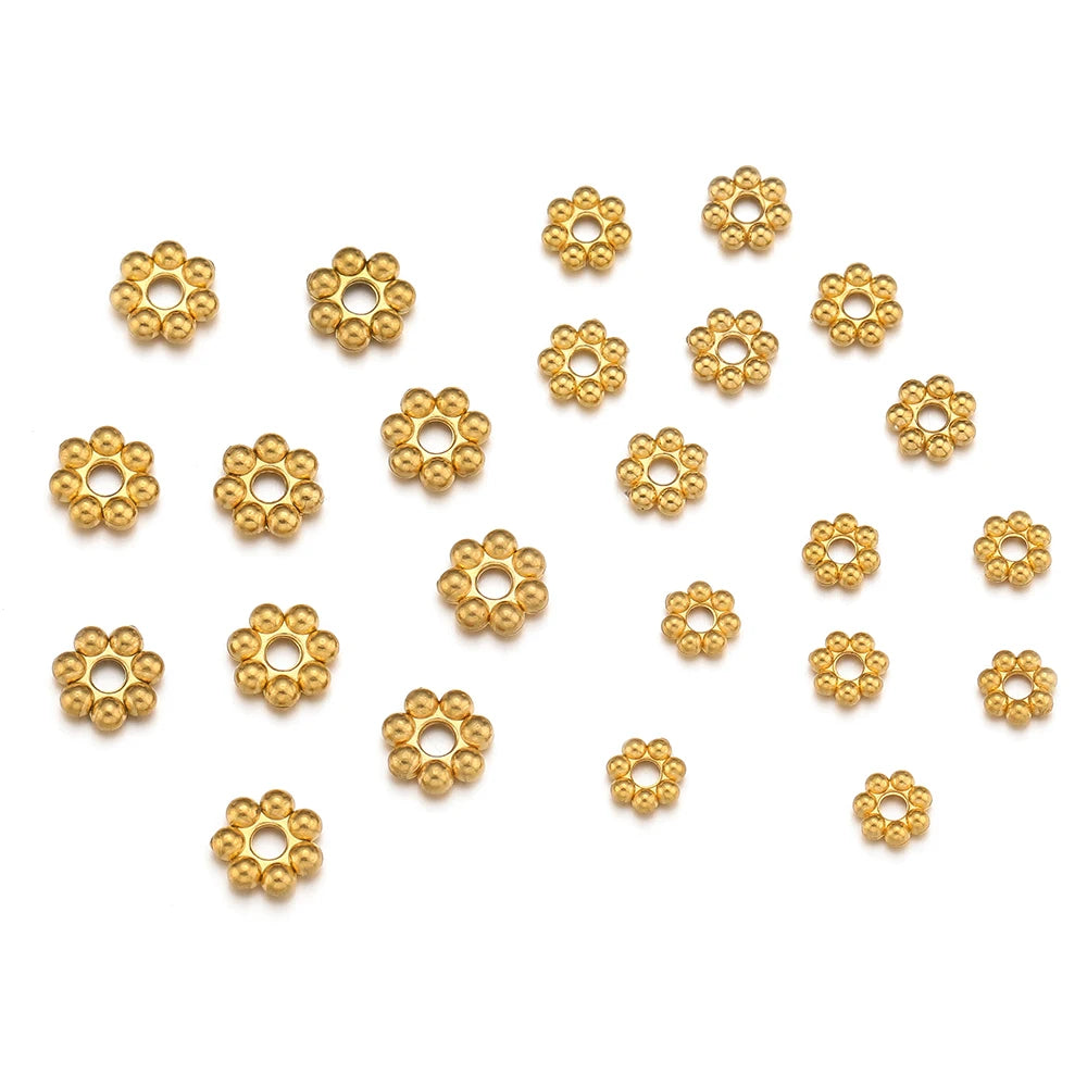 Gold flower-shaped loose spacer beads, small round bead cluster design.