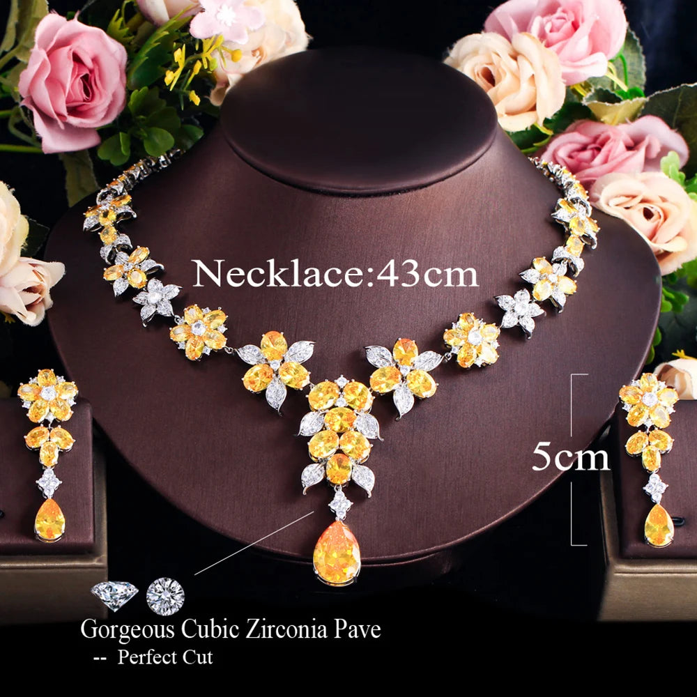 Yellow and clear flower zircon necklace and earrings, shown with length measurements
