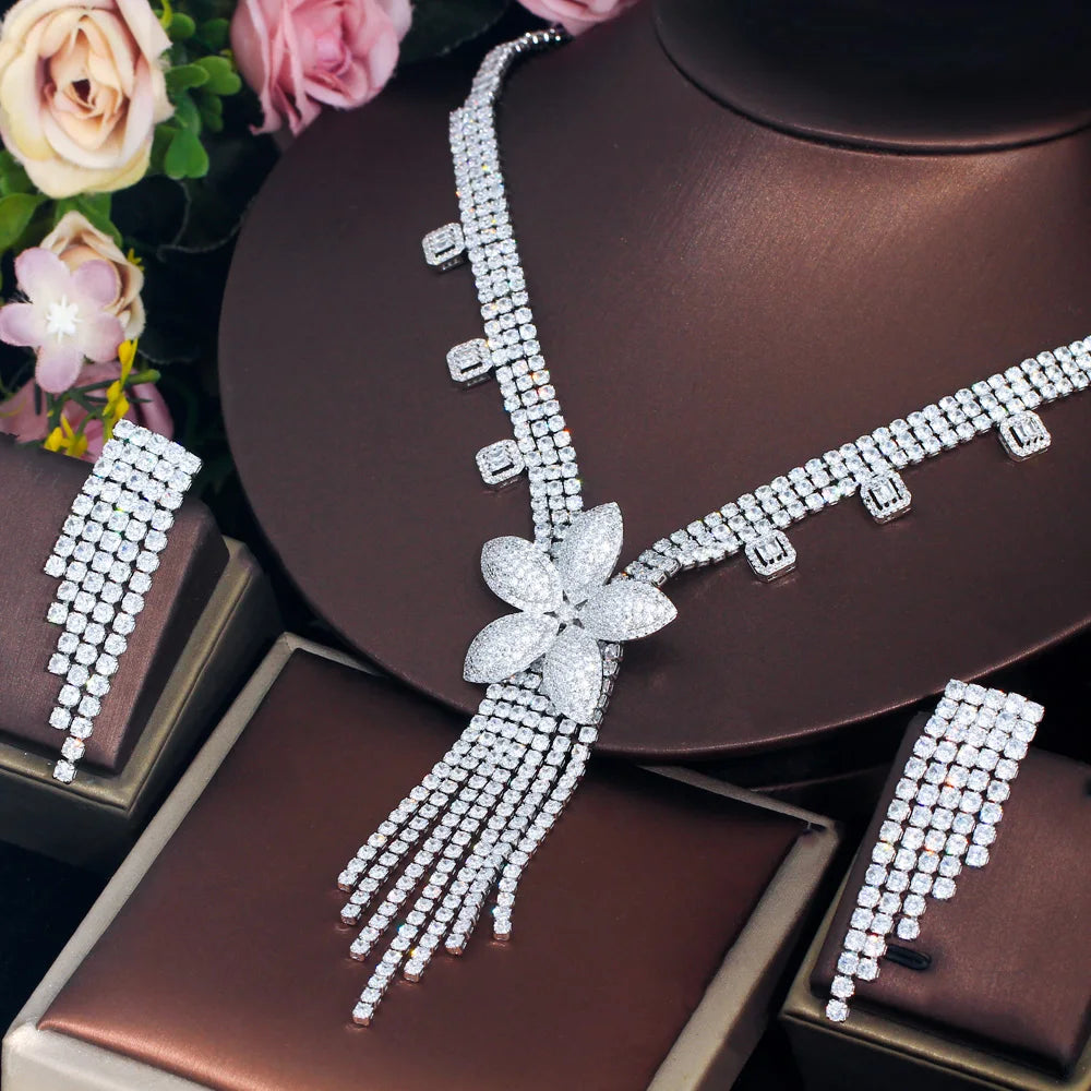Crystal bridal jewelry set with flower pendant, long tassel necklace, and square charm accents