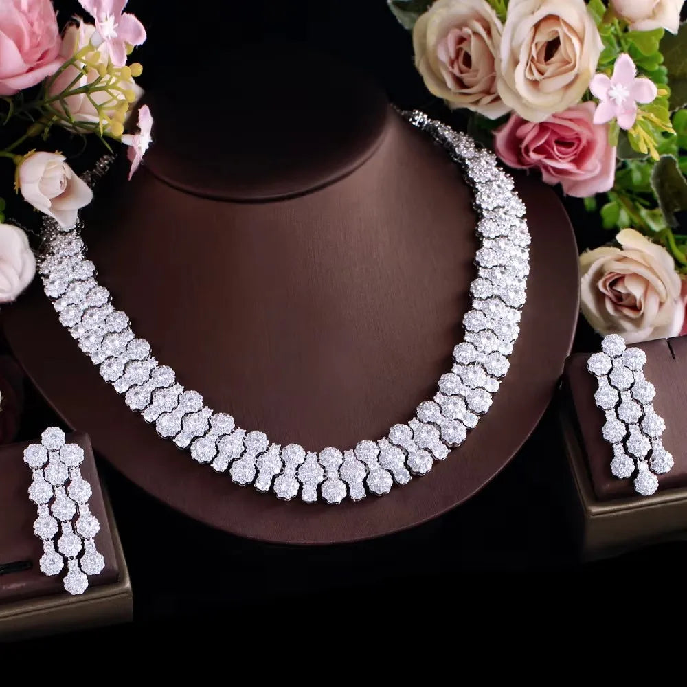 Flower-shaped crystal necklace with matching long drop earrings