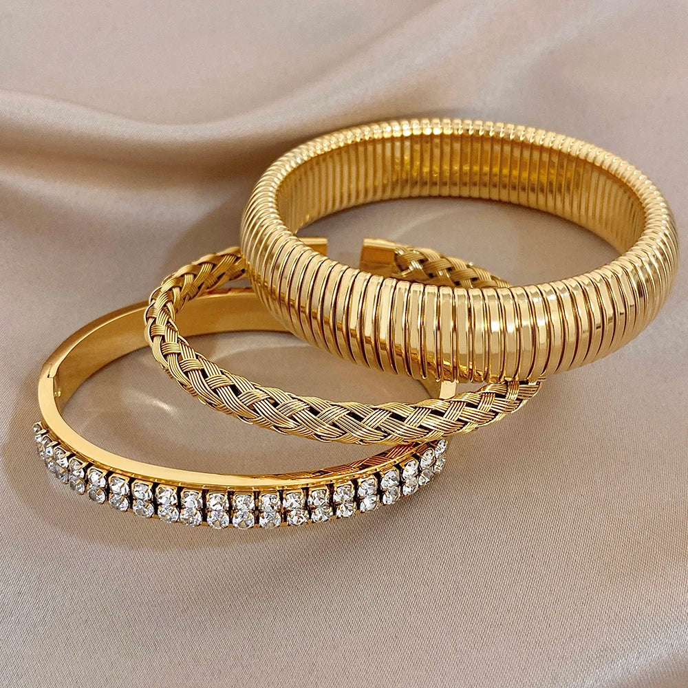 Gold-tone ribbed cuff bangle with braided bracelet and zircon pave bangle