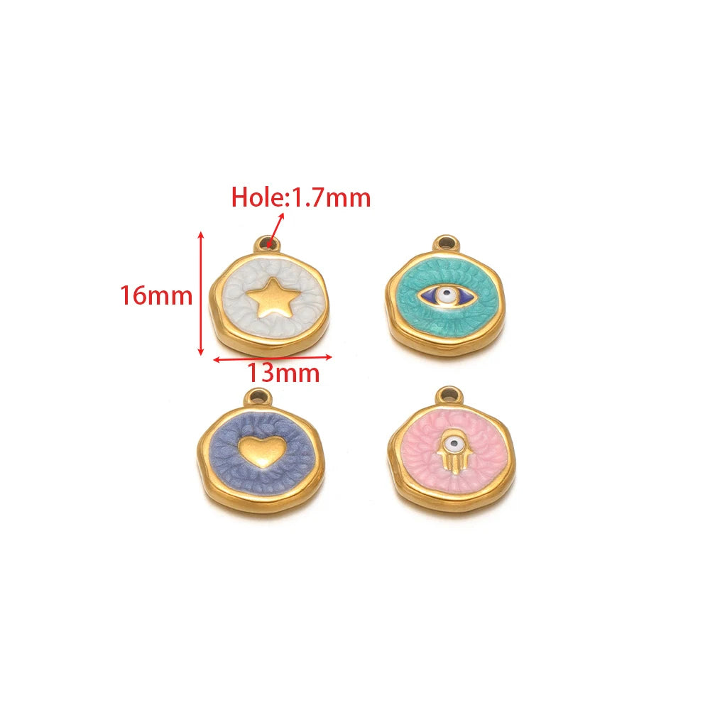 Round enamel charm pendants with star, heart, and hand-eye motifs; gold frames