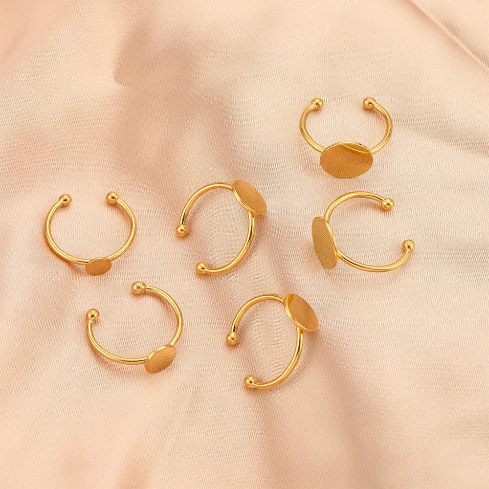 Gold ring blanks with round cabochon bezel discs and small ball posts