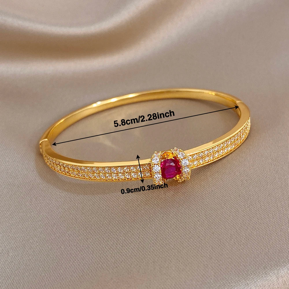 Gold zircon cuff bangle, 5.8cm diameter, pink round center stone, crystal pave band
