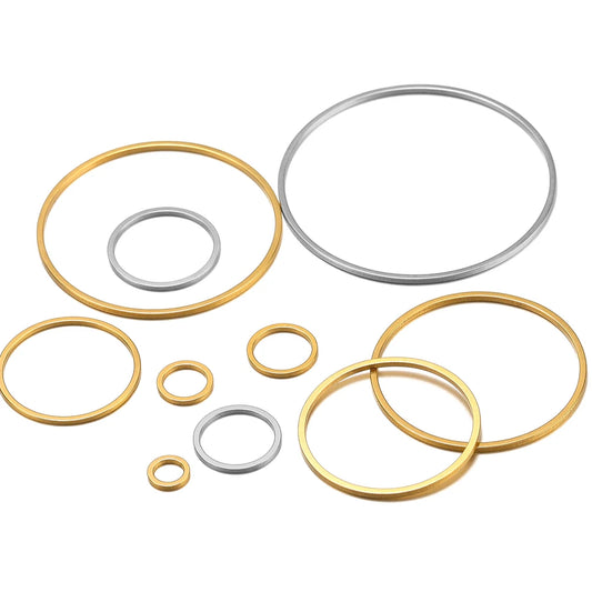 20-piece stainless steel hollow circle bezel charms set, mixed gold and steel-tone rings
