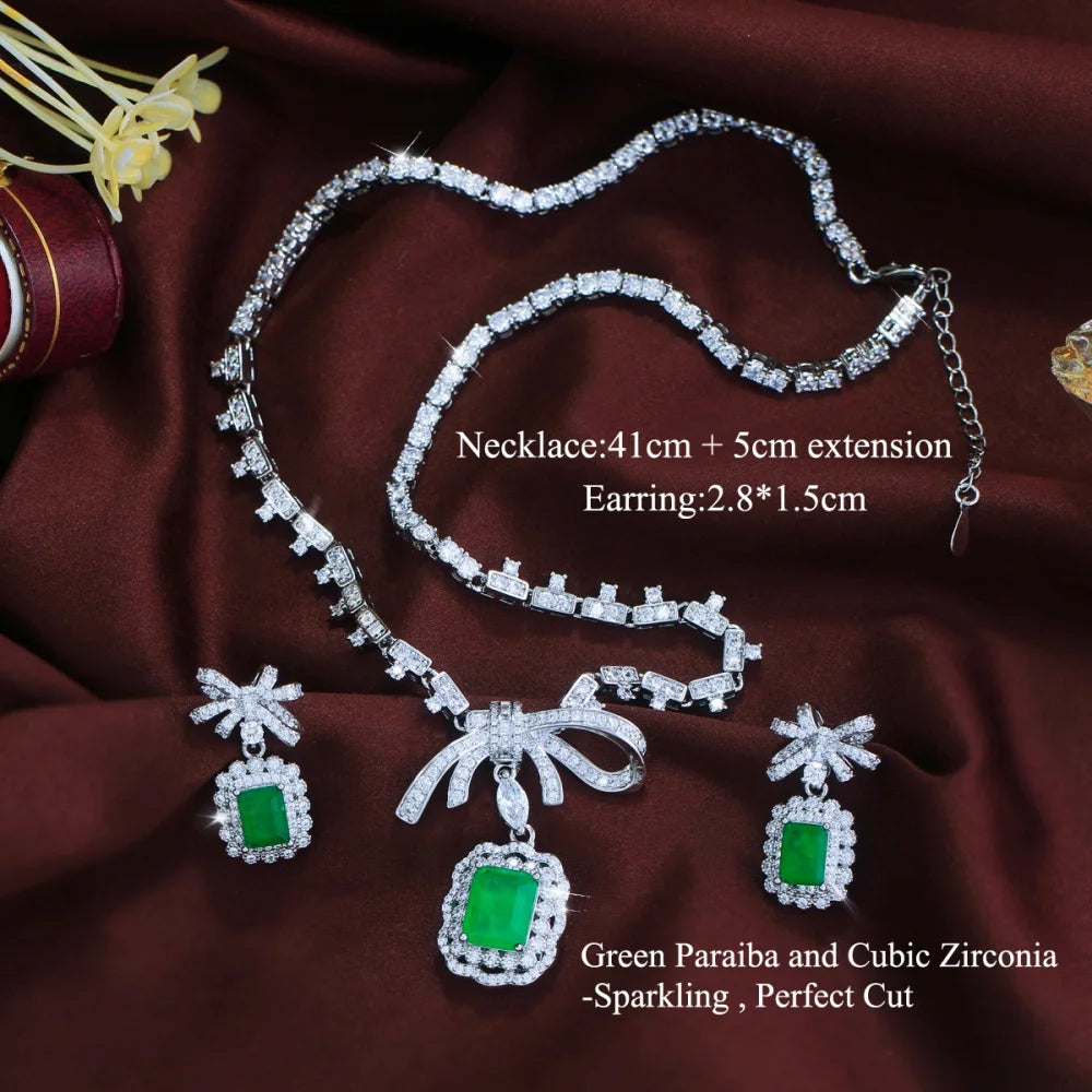 Green CZ bow necklace and dangle earring set with square frame green drops