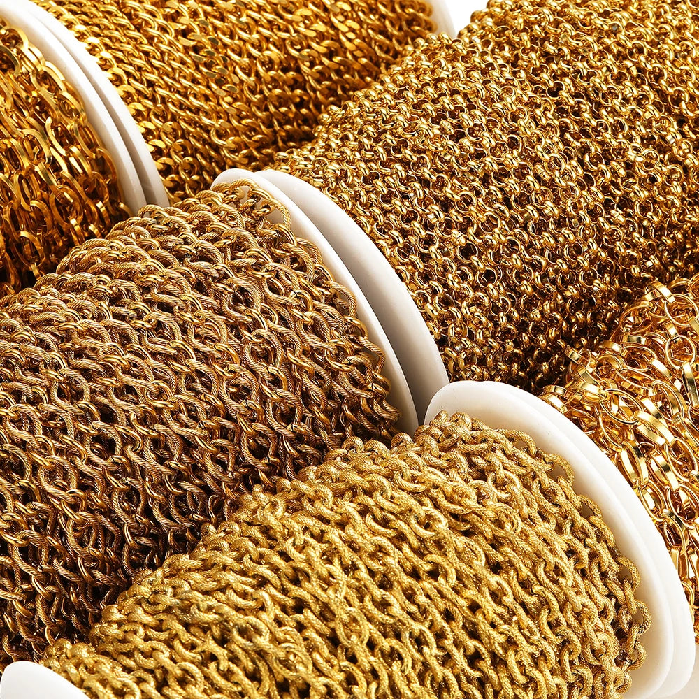 Gold Cuban link chain, chunky interlocking links coiled on a spool