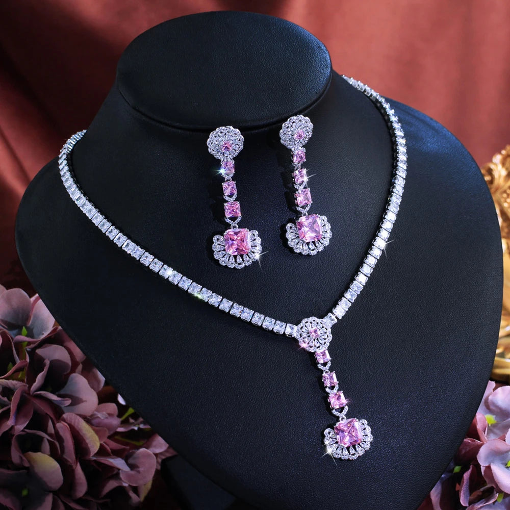 Silver-tone jewelry set with pink zirconia drop earrings and pendant necklace