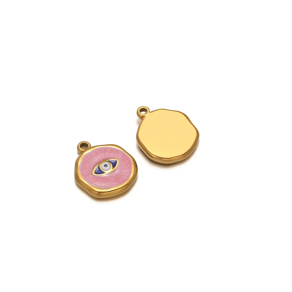 Two gold-tone enamel charms: pink evil eye and plain gold heart pendant