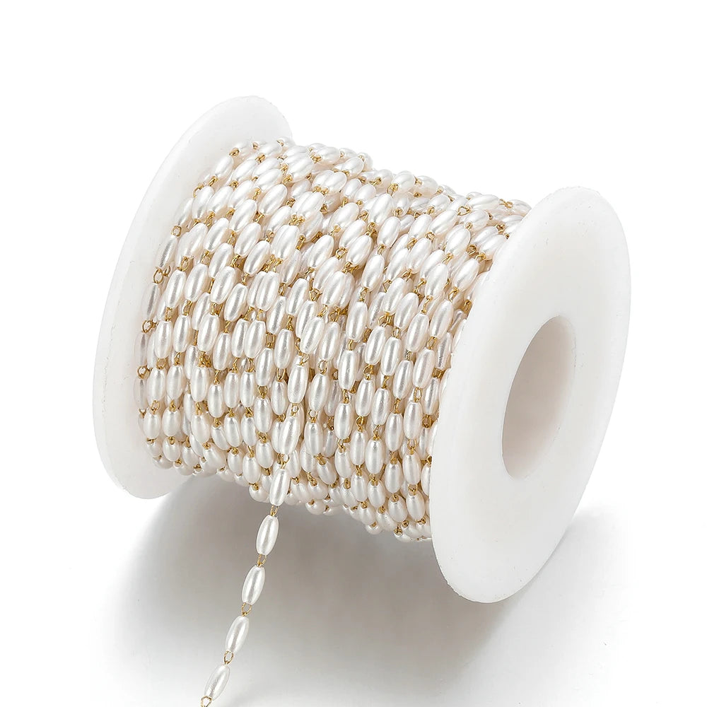 Pearl bead chain on white spool, white oval beads with gold-tone metal links