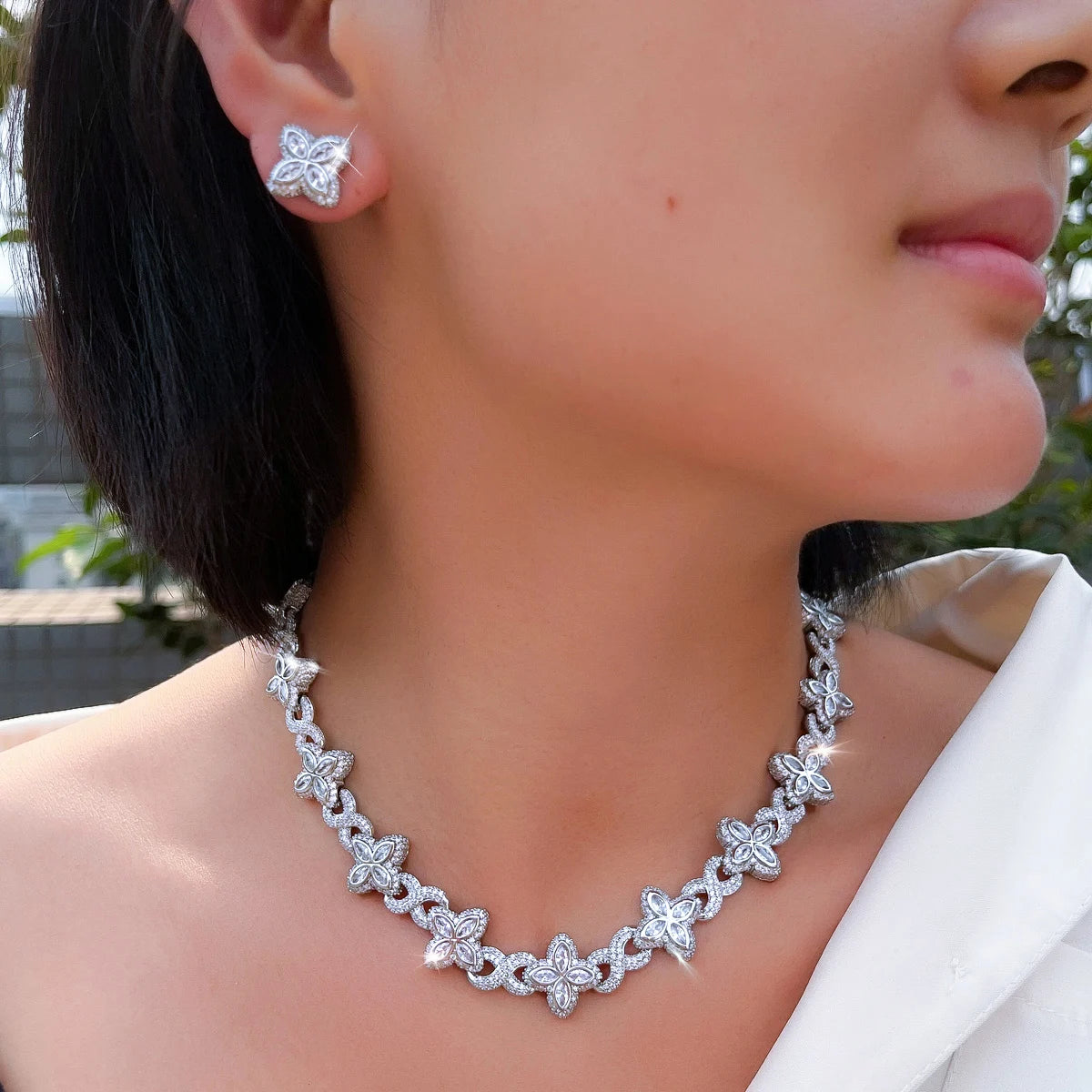 Four-leaf clover zirconia necklace and stud earring set, silver-tone metal