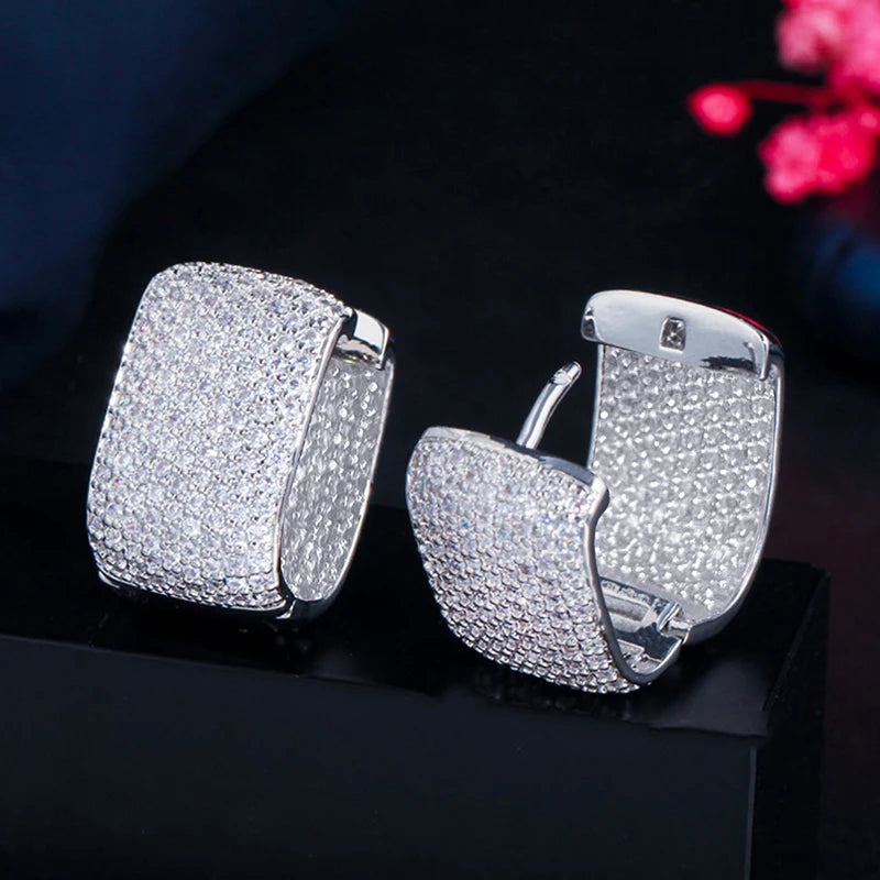 Square cubic zirconia hoop earrings in silver tone with hinged clasp detail