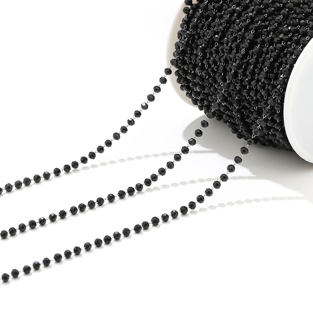Black beaded necklace chain with small round beads, looped strands