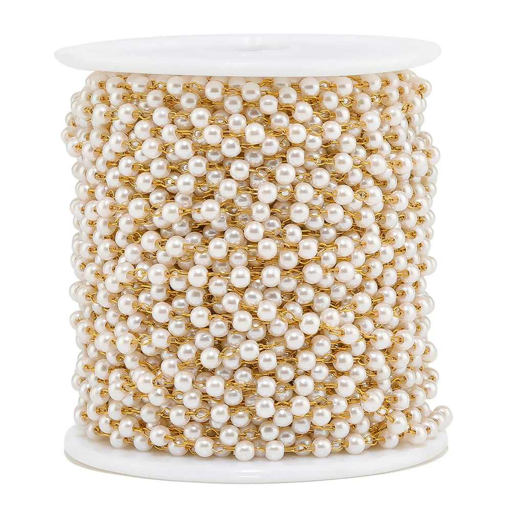 Spool of white imitation pearl chain with gold-tone links, round pearl beads for DIY