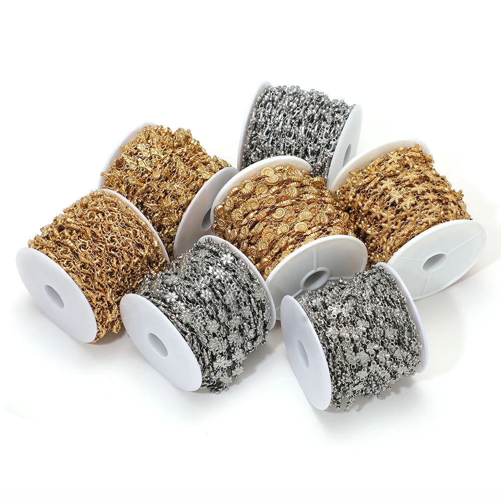 Assorted gold and silver sea-animal charm chain spools for DIY jewelry and crafts