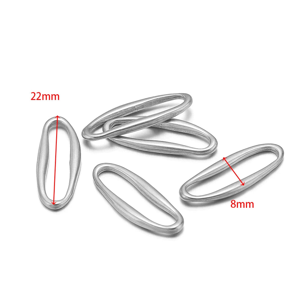 Silver irregular oval link charms, 5-pack; marked 22mm and 8mm
