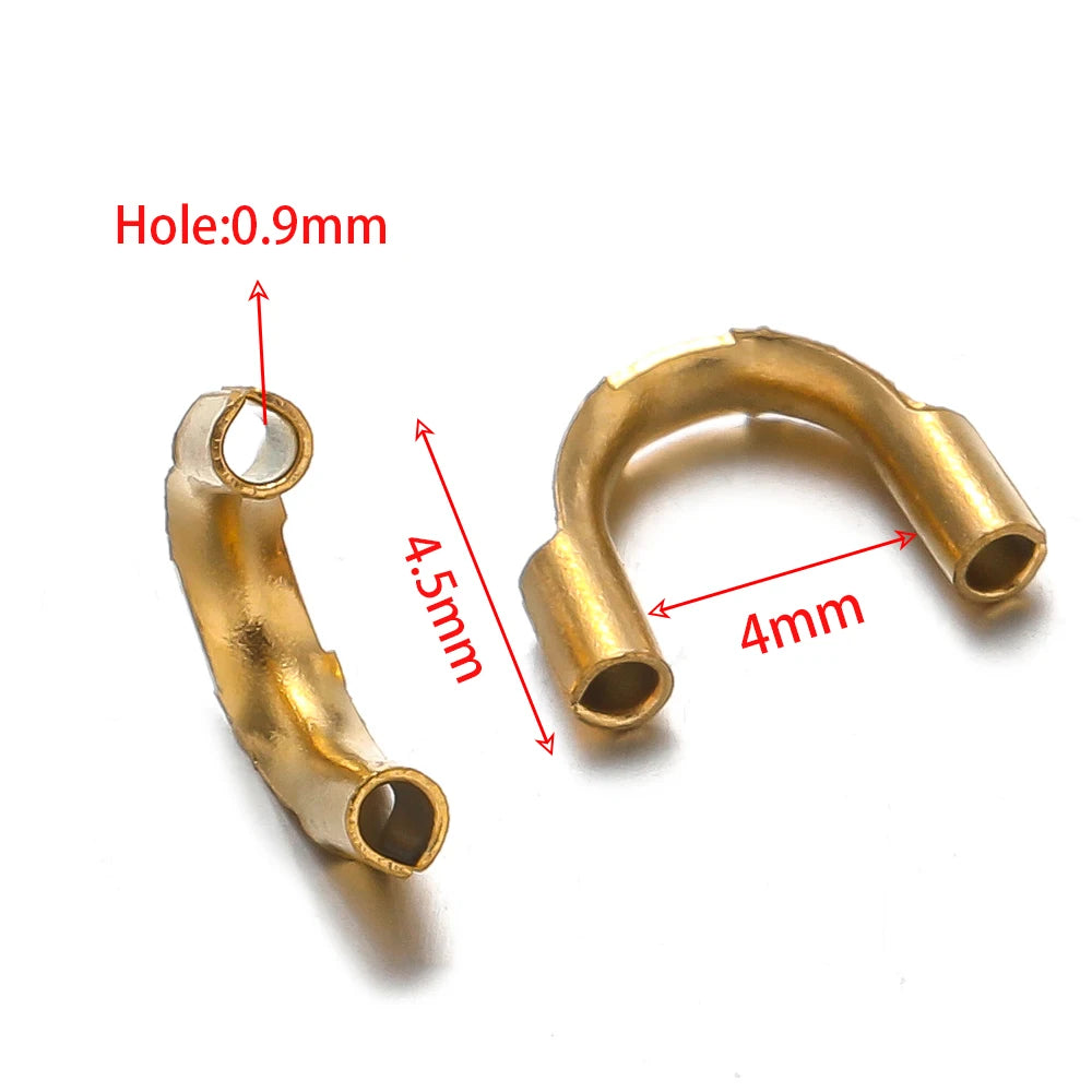 Gold U-shaped wire connector clasps with small side openings for wire protection