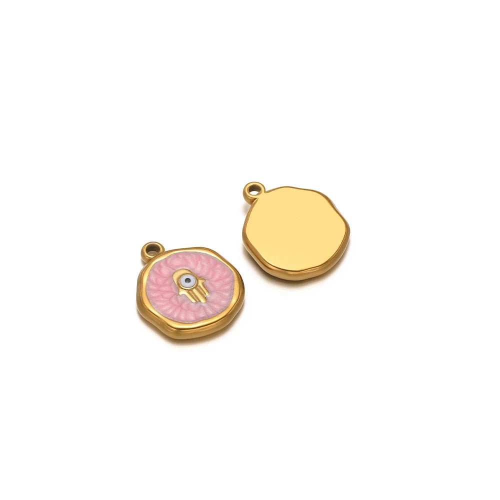 Evil eye charm pendants: pink enamel hand icon with gold border and plain gold drop charm