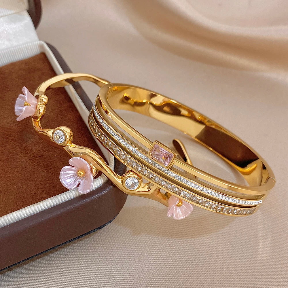 Gold-plated pink floral cuff bangles with multicolor rhinestone and crystal details