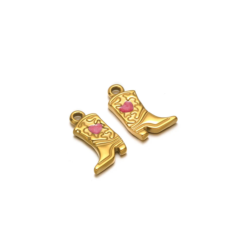 Pair of gold-tone long boot charms with pink heart inlays and loops