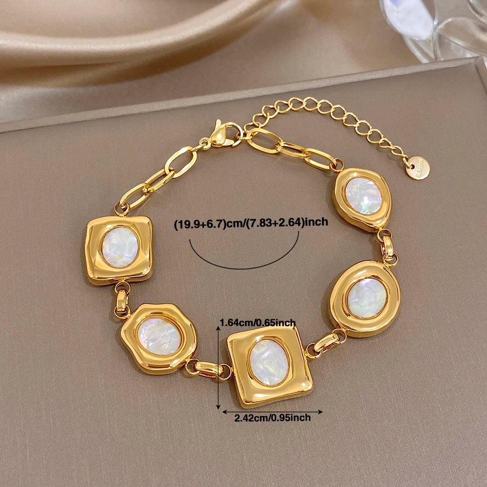 Gold-plated geometric shell bead link bracelet with square and oval white inlays