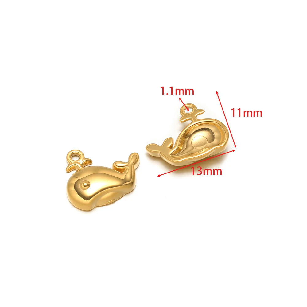 Gold-tone whale charm with connector loop