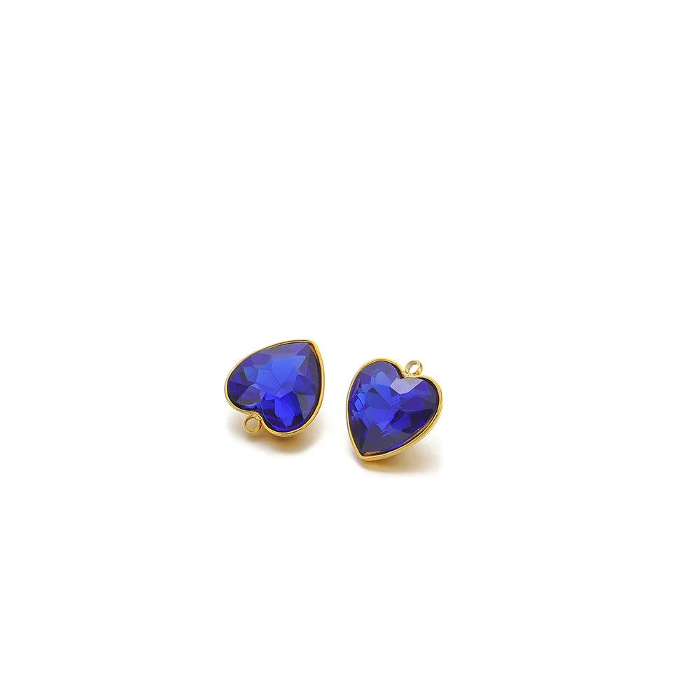 Heart-shaped crystal pendant charm, bright blue stone with gold-tone loop bail