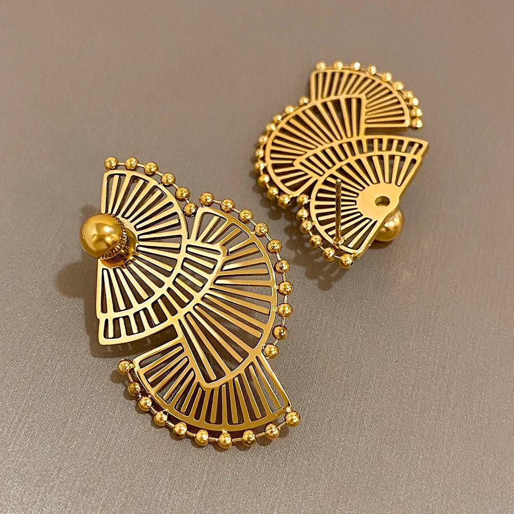 Gold-tone openwork fan earrings, one showing the back and post fastening