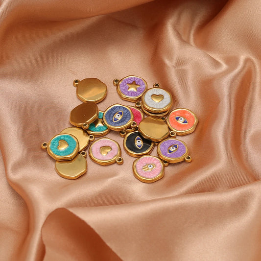 Gold-tone enamel charm lot with evil eye, hearts, and stars, various colors