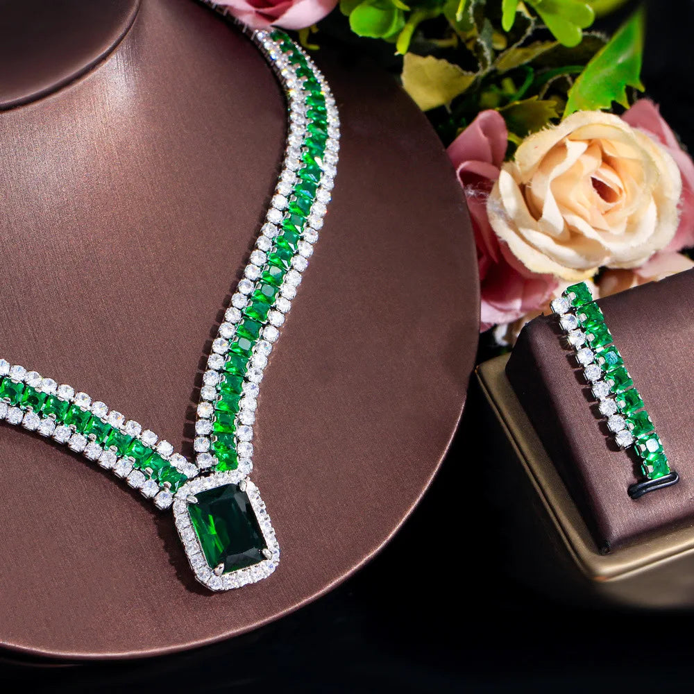 Green cubic zirconia rectangle pendant and matching drop earring, close-up detail