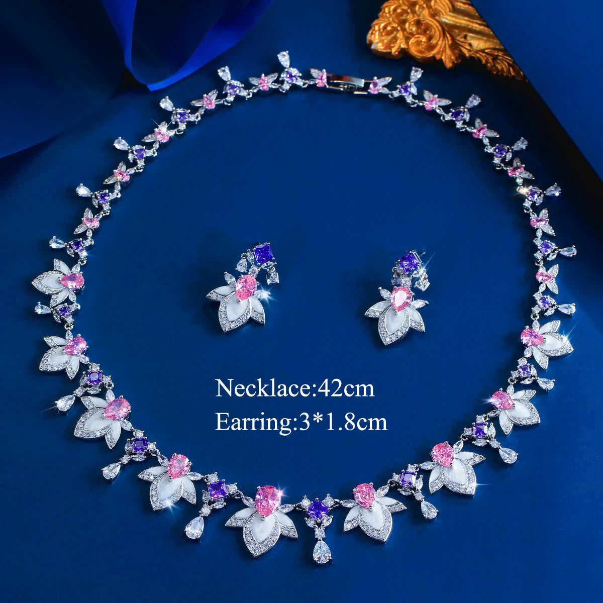 Multicolor cubic zirconia necklace and earring set with flower and leaf-shaped charms