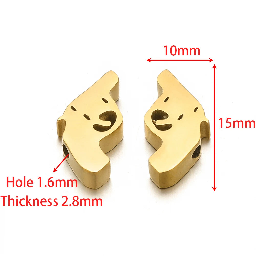 Gold-tone stainless steel spacer beads shaped like cat faces with small side holes