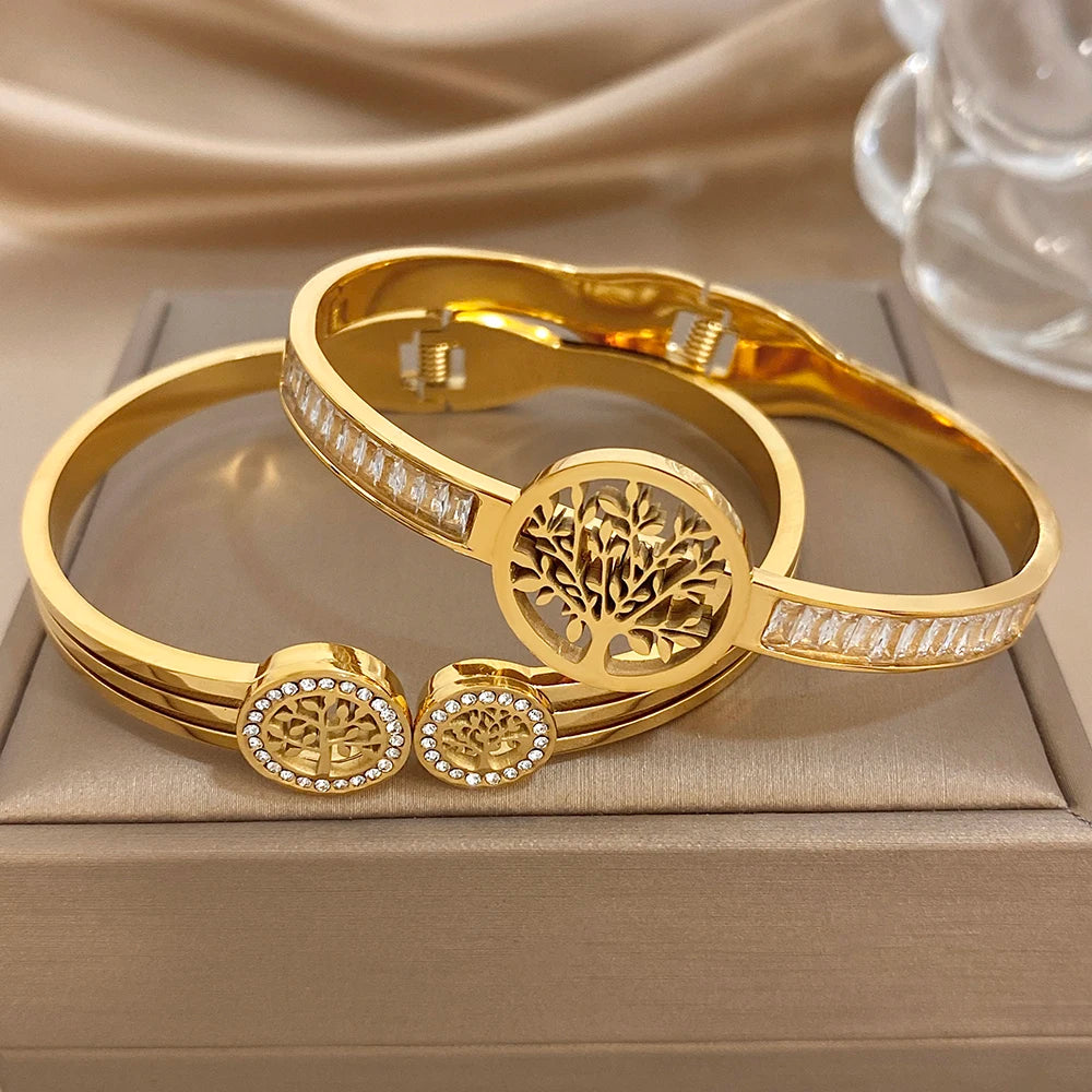 Gold-tone bangle bracelet set with tree-of-life center and round zircon-stone insets
